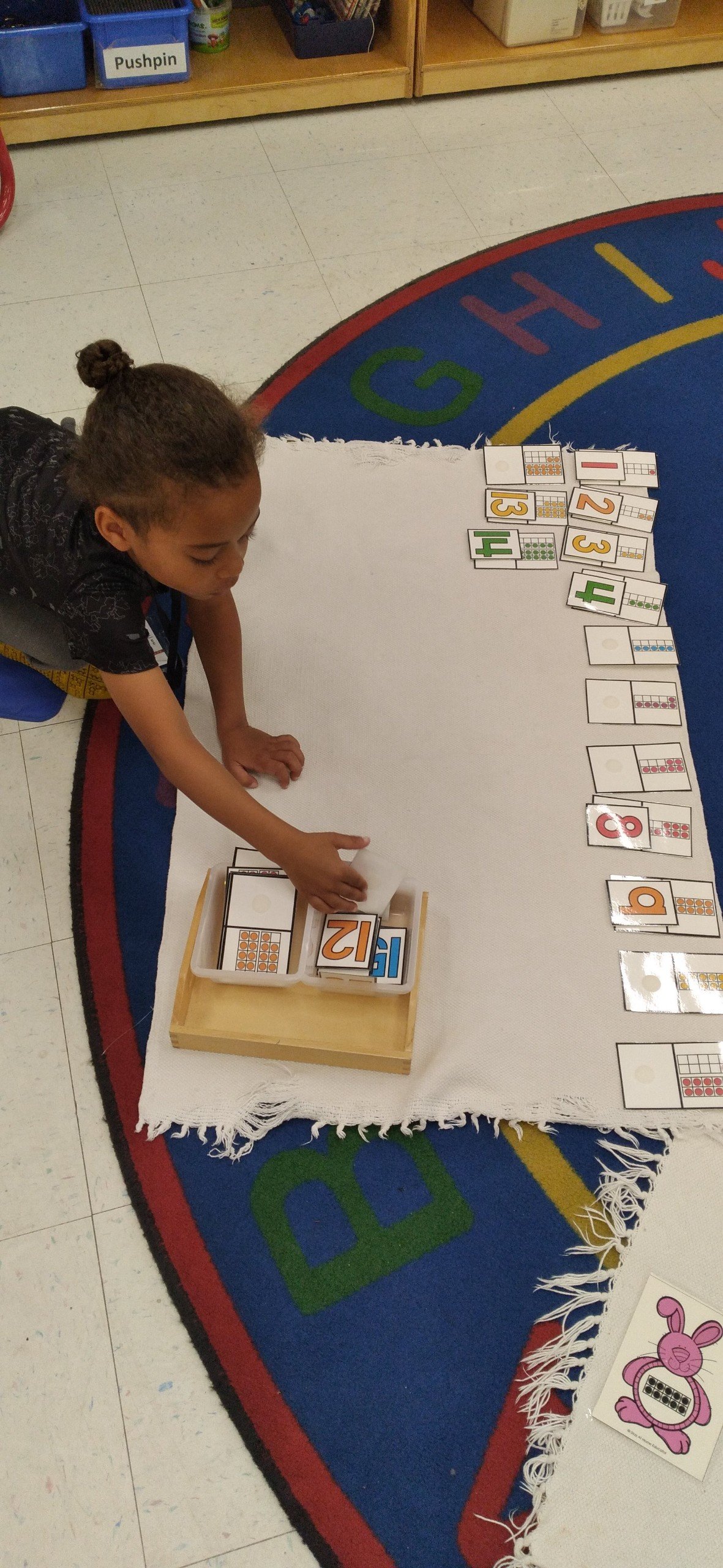 Jerusha Terry engaging children in hands-on learning activities