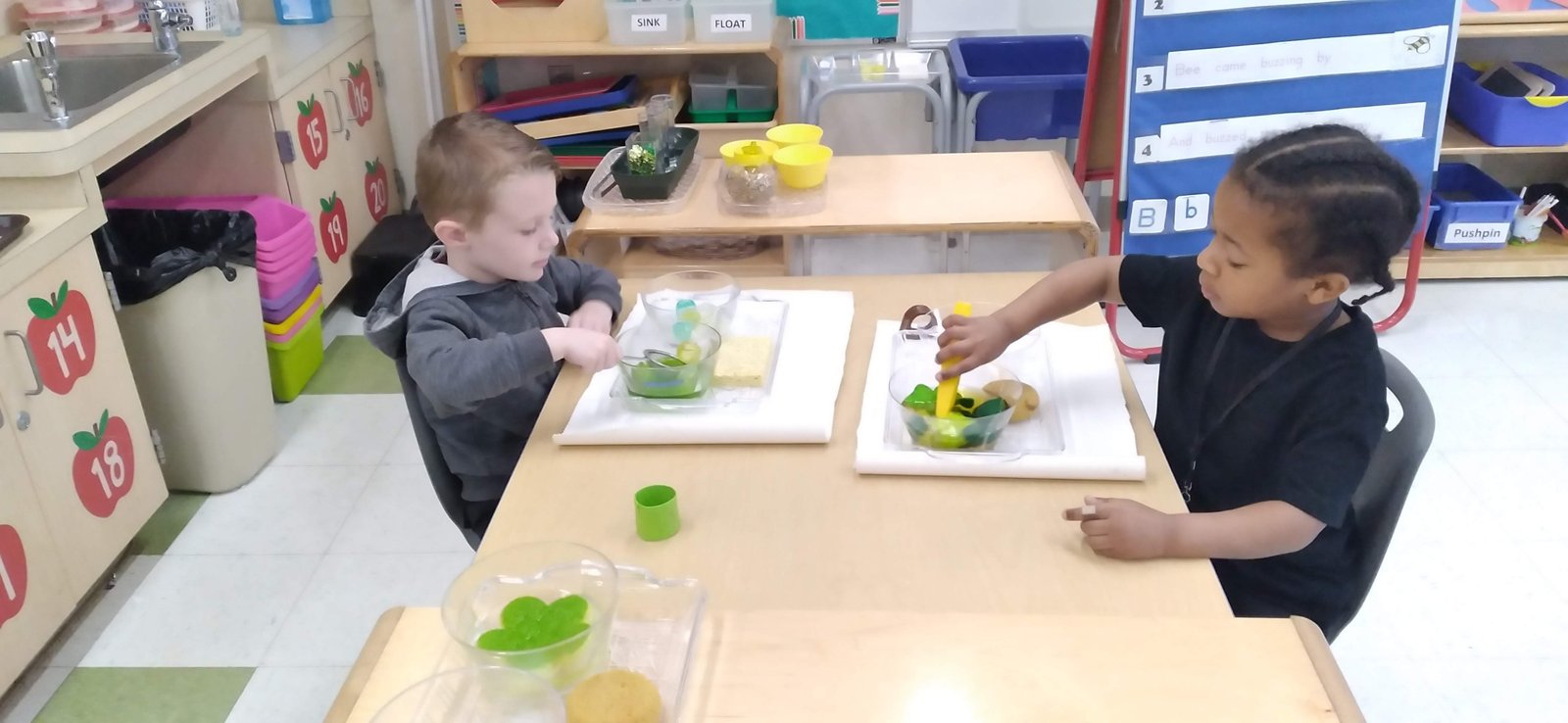 Children learning together with Jerusha Terry in a guided microschool lesson