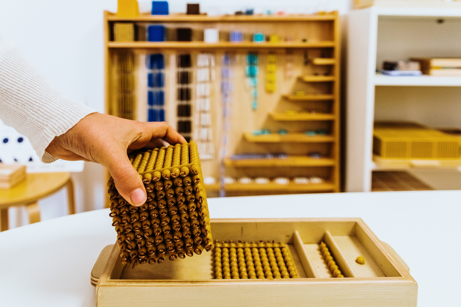 Montessori golden beads for numeracy understanding