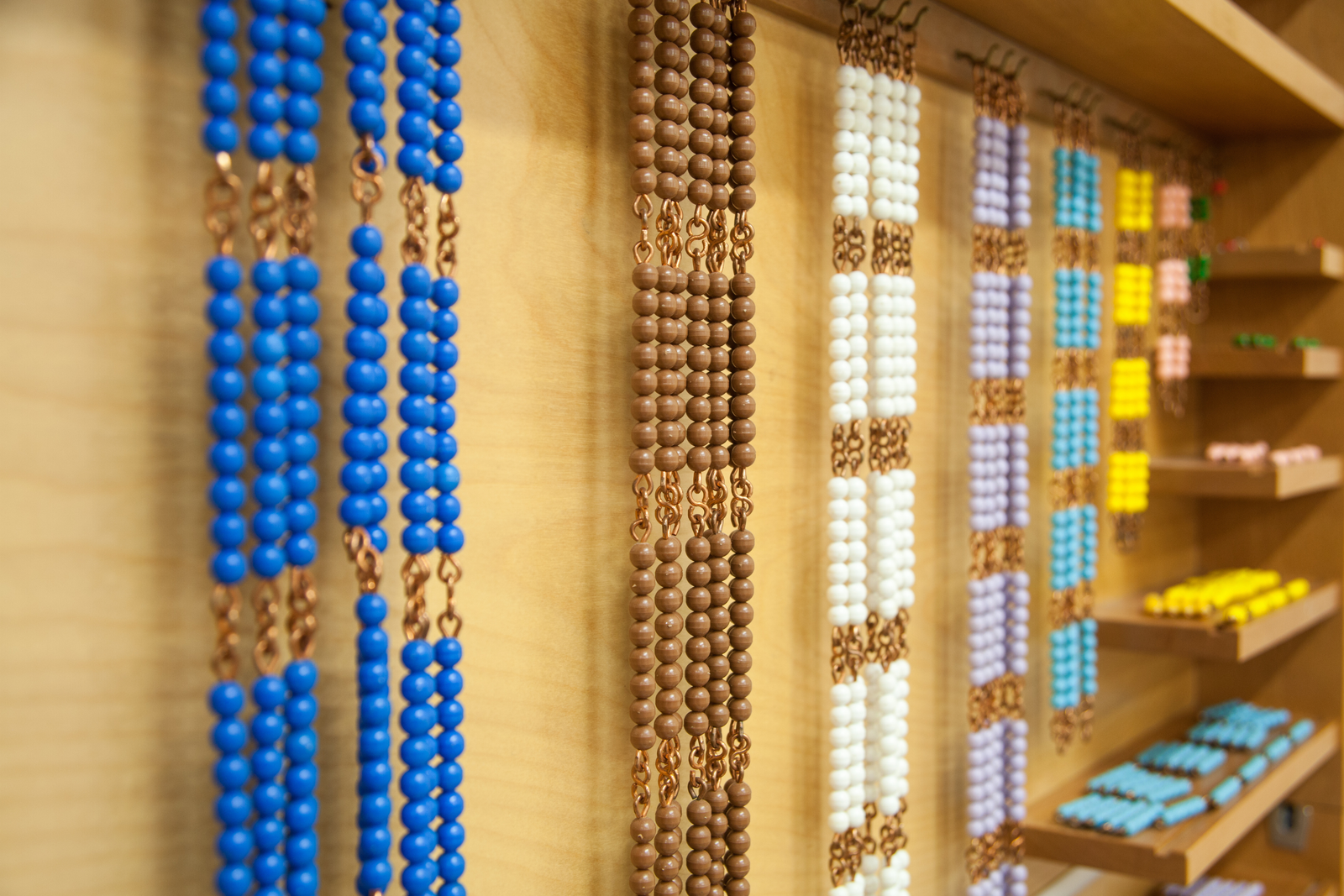 Colorful Montessori bead chains for numeracy learning